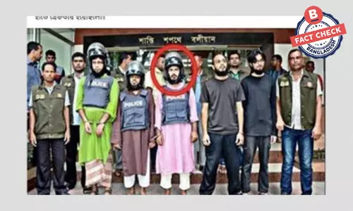 ছবির গোল চিহ্নিত ব্যক্তি হুজাইফা আল মামদূহ নয় ছবির গোল চিহ্নিত ব্যক্তি হুজাইফা আল মামদূহ নয়